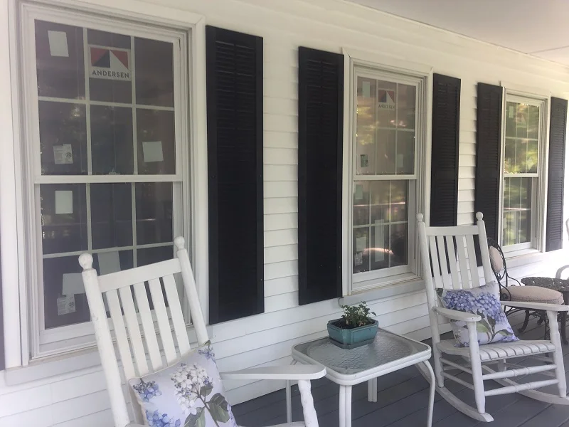 Exterior view of Andersen 400 Series windows on a porch